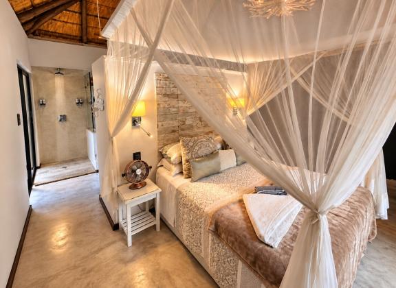 Rustic Luxury Bedroom with Open Shower.jpg