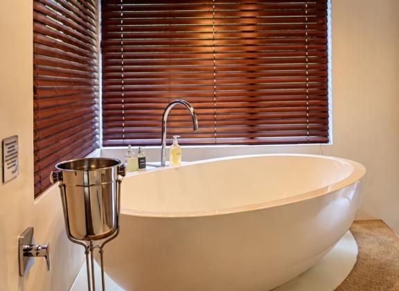 Rustic Spa Bathroom with Oval Bathtub.jpg