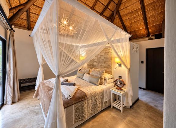 Warm Rustic Canopy Bedroom Retreat.jpg